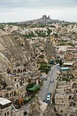 Panorama from a top of a hill over Goreme with Uchisar castle in background at Cappadocia, Anatolia, Turkey
