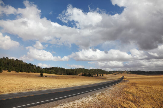 Road and the magnificent cloudy sky