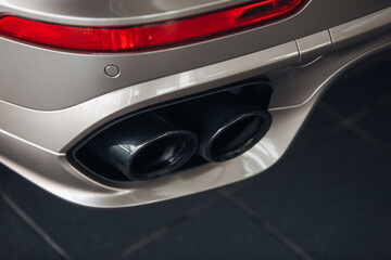 Obraz na płótnie Canvas Modern and luxury sports car exhaust system pipes