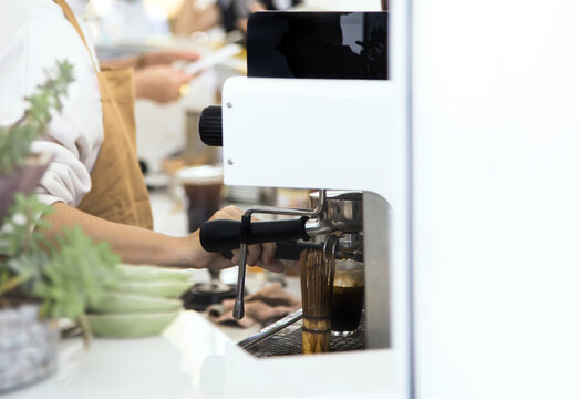 coffee on maker matchine with barista