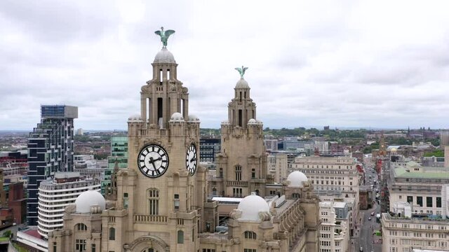 Liver building in Liverpool. Medium wide drone rotaion shot showing liverpool skyline. 

4K 25FPS 10bit DLOG-REC709