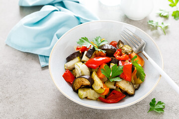Baked vegetables salad with fresh parsley