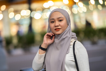 Young teenager waiting vehicle at stop station.