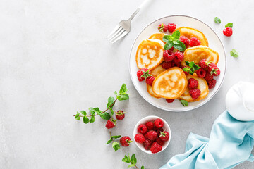 Breakfast pancakes with fresh raspberry