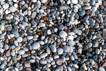 Multi-colored pebbles background. Close up.