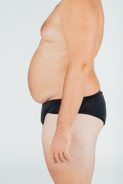 Man wearing underpants, neck down