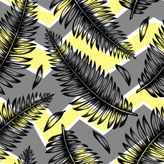 Obraz premium Abstract graphic seamless pattern with tropical leaves