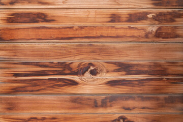 Old brown wooden texture background with space for text. Top view of natural tree plank. Grunge dark wooden background. The surface of the old brown wood. Vintage rustic style. Wooden tiles pattern