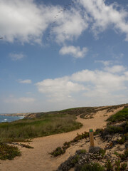 Beautiful scene on the Almograve trail, part of the the Vicentina Route, that mix sandy beaches, cliffs and vegetation. 
Odemira, Portugal.