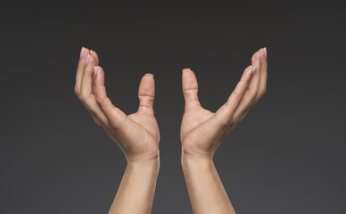 Woman's hands offering support