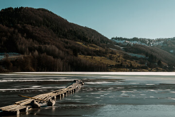 wooden bridge over lake