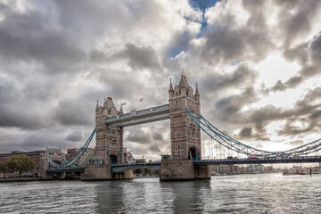Tower Bridge with dramatic cloudy sky in London, England, UK