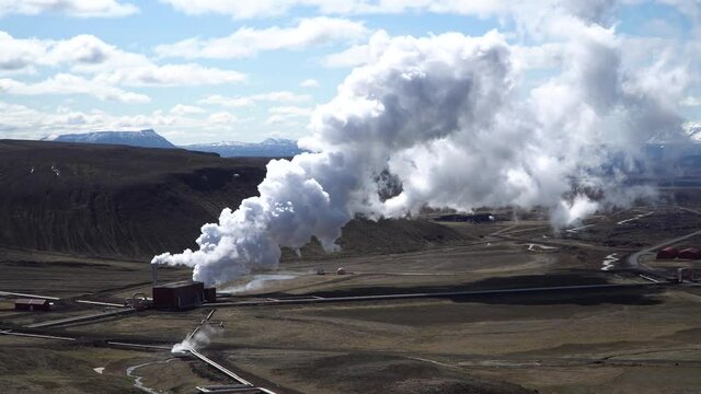 Geothermal facilities in Hverir Myvatn geothermal area with boiling mud pools and steaming fumaroles in Iceland