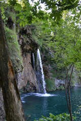 Fototapeta na wymiar Plitvice lakes in Croatia. Turquoise water, waterfalls, woods, nature
