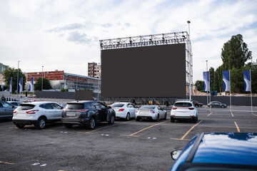General view of cars parked in drive-in cinema