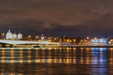 Fototapeta na wymiar Russia, St Petersburg, Night view of the Alexander Nevsky Bridge on Neva River