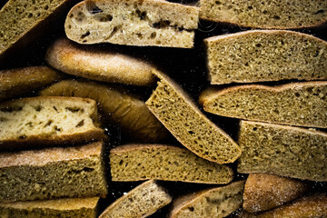 Stack of home made wheat bread in freezer drawer, healthy bio organic food for vegan diet, gluten free