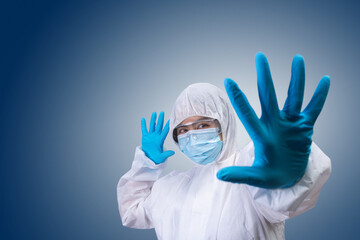 Doctor wearing a face mask and surgical gloves, Close-up hand holding covid vaccine.