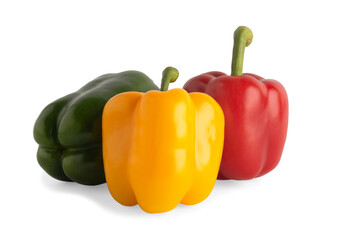 Yellow-green red bell peppers are on the white back.