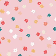 Fototapeta na wymiar Small colorful flowers on a pink background seamless pattern design. Trendy illustrated vector pattern for brand identity, stationery, wrapping, and wallpapers. Minimalistic floral background.
