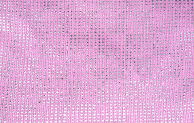Texture knitted pink fabric and silver dotted small pattern as blotches