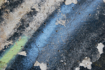 Textura de pared de hormigón con restos de graffiti