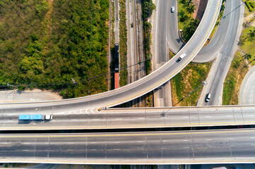 Aerial view of cargo Truck and train container on highway road with car, transportation concept.,import,export logistic industrial Transporting Land transport on the asphalt expressway
