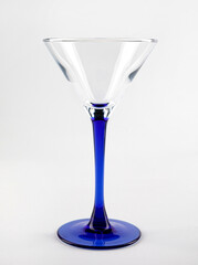 The martini glass is isolated on a white background.