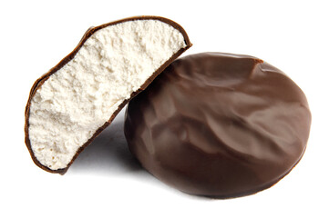 Marshmallows in chocolate are isolated on a white background.
