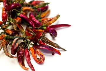 Dried red peppers, isolated on a white background.