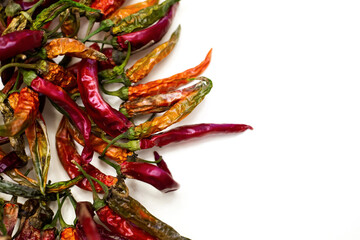 Dried red peppers, isolated on a white background.