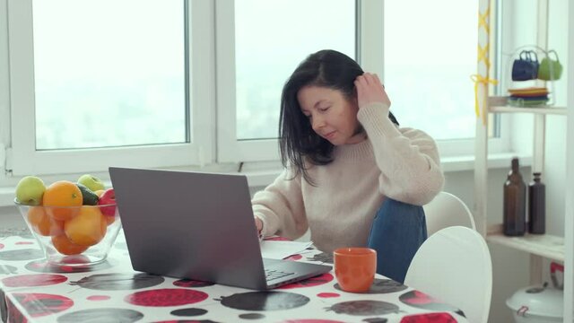 adult business woman typing on laptop computer working in internet, female professional user lady using pc technology doing online job in office or browsing web sit at home