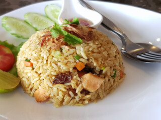 Delicious fried rice on white plate background