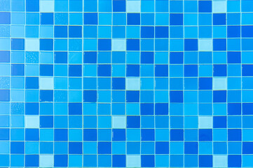 Swimming pool bottom ceramic mosaic blue and white.