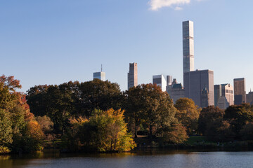 The Lake at Central Park with Colorful Trees during Autumn and the Midtown Manhattan Skyline of New York City