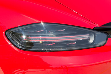 Close-up  car rear tail-lamp with a brakelight stop signal.