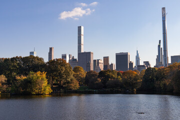 The Lake at Central Park with Colorful Trees during Autumn and the Midtown Manhattan Skyline of New York City