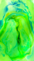 Blue liquid digital painting is spreading on green liquid
