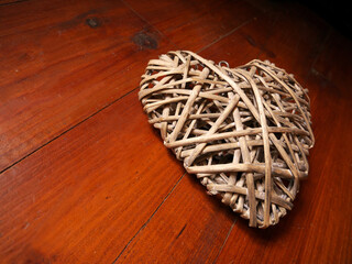 Rustic photo of a heart woven with straw