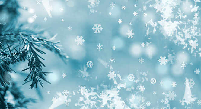 Blue abstract winter background. Snowflakes and snow with bokeh effect.