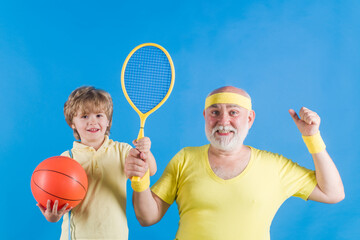 Family Sporting. Sport game. Workout together. Portrait of grandfather and son working out. Granddad and kid boxing.