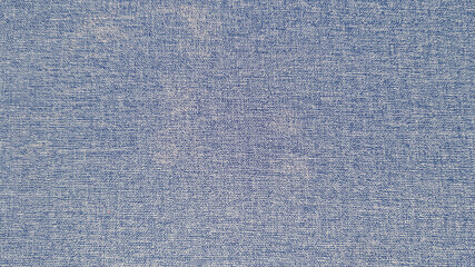 Textured of blue wool carpet or rug for background or wallpaper e. Soft material and Jeans pattern concept 