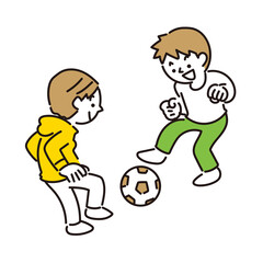 サッカーボールで遊ぶ男の子たち