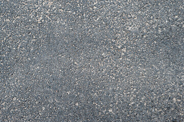 Gray asphalt with relief. Texture Background.