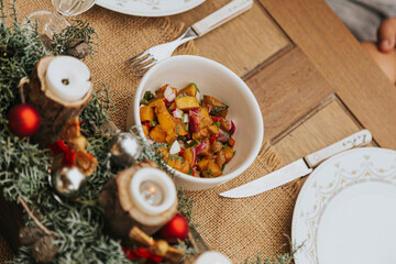decorated Christmas table full of food