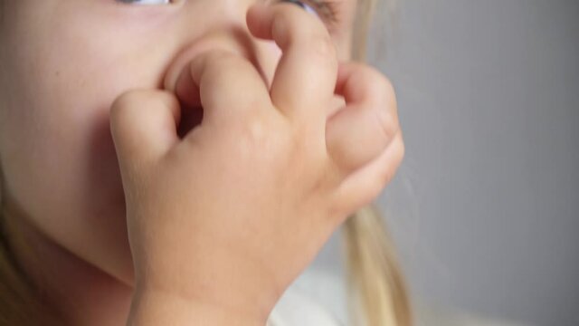 nose picking. Child picking his nose