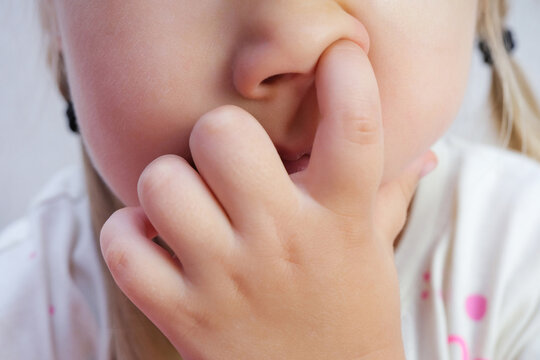 Nose Picking. Child Picking His Nose