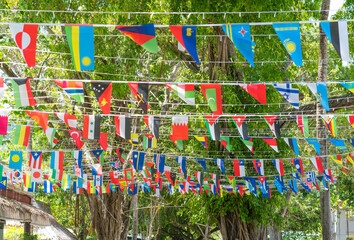 Stretched ropes with flags of different countries
