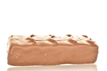 One sweet chocolate bar, close-up, isolated on white.