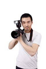 A young male photographer with a camera 